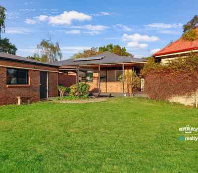 Spacious outdoor area complements this inviting property, perfect for relaxation and entertaining in a family-friendly neighborhood.