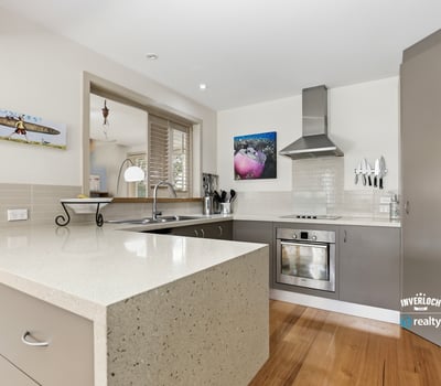 Modern kitchen featuring sleek cabinetry, ample counter space, and a seamless blend of functionality and design.