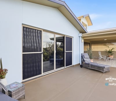 Spacious outdoor area featuring ample seating, ideal for relaxation and enjoying expansive views.