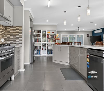 Modern kitchen featuring sleek cabinetry, stainless steel appliances, and an open layout perfect for entertaining.