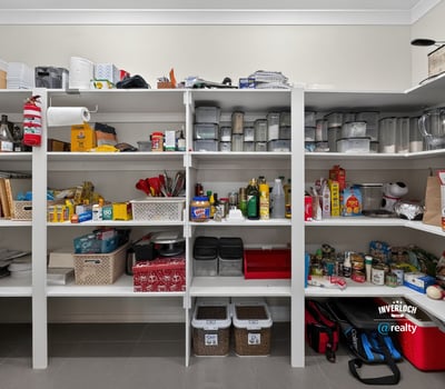 Spacious pantry featuring ample shelving and organized storage for all your cooking essentials and pantry items.