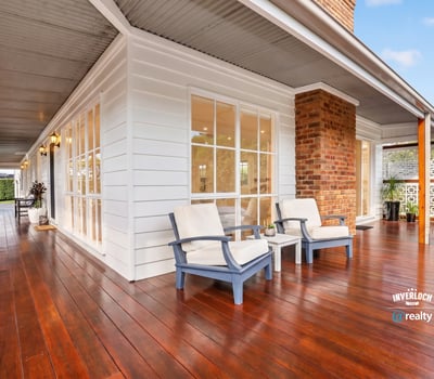 Spacious deck perfect for outdoor relaxation, featuring ample natural light and modern architectural details.
