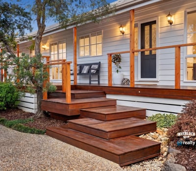 Discover outdoor living with a welcoming entryway, perfect for entertaining or enjoying peaceful moments.