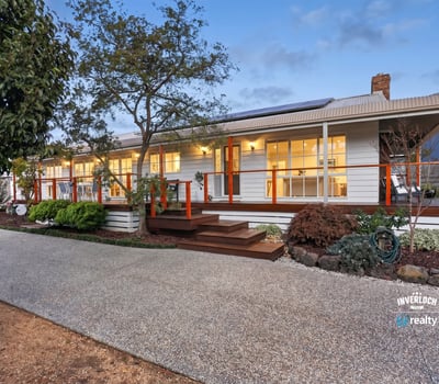 This inviting home features spacious outdoor areas and modern amenities, perfect for comfortable living and entertaining.