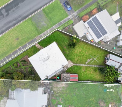 Spacious property featuring a generous yard and versatile layout, perfect for outdoor activities and potential expansions.