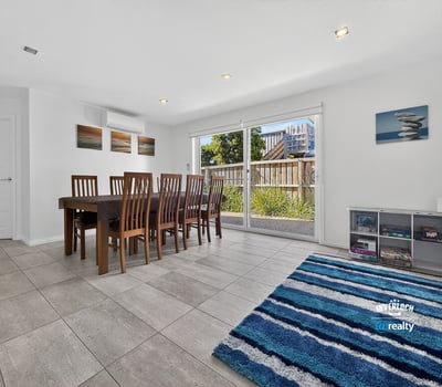 Spacious dining area with natural light, offering a seamless connection to the outdoor space.
