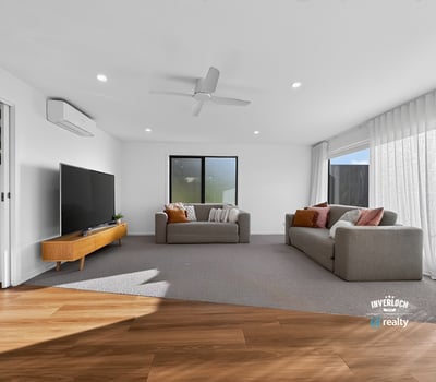 Bright and spacious living area features modern finishes and abundant natural light, perfect for relaxation.
