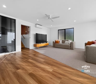 Bright and spacious living area featuring modern design and seamless indoor-outdoor flow.