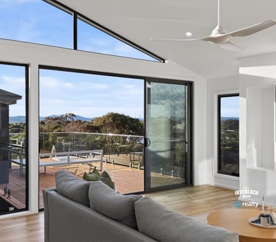 Bright open-plan living space with expansive views and seamless indoor-outdoor flow, perfect for modern living.
