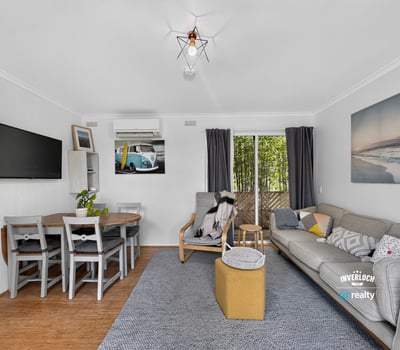 Bright and inviting living area with modern furnishings, perfect for relaxation and entertaining.