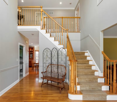 Welcoming and elegant two-story entrance foyer.