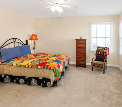 Roomy Bedroom 3 has a fan/light, double windows, and a large closet.