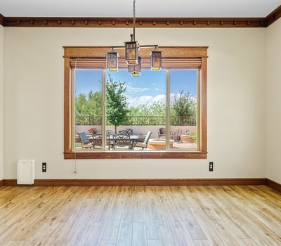 Enjoy natural light and peaceful outdoor scenes from this inviting dining area. Framed by Arts & Crafts trim, it's perfect for everyday meals or entertaining.