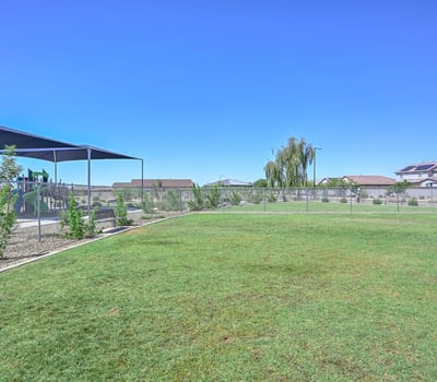 This grassy, fenced-in dog park is a major plus for pet lovers offering room to run and shaded benches nearby. Just steps from your new Peoria home in Rancho Cabrillo, it adds everyday convenience for your furry companions.