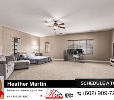 The oversized primary suite offers generous square footage and a calming atmosphere. Perfectly positioned within this Glendale home designed for both comfort and entertaining.
