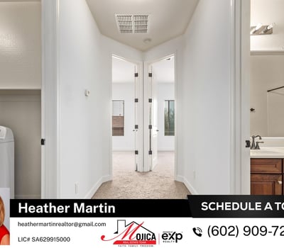 The upstairs corridor connects generously sized bedrooms and includes a convenient laundry space. Designed for comfort and efficiency, this Glendale property offers practical living with thoughtful layout.