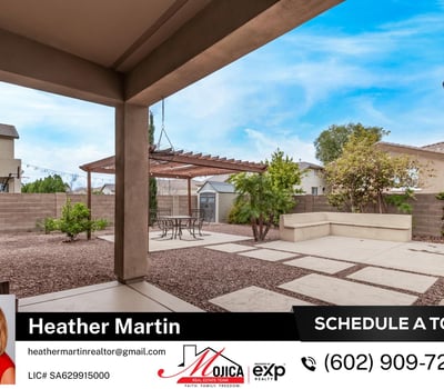 The covered patio overlooks the pergola and pool area, offering a seamless extension of indoor living. This Glendale home highlights energy efficiency, outdoor upgrades, and inviting entertaining spaces.