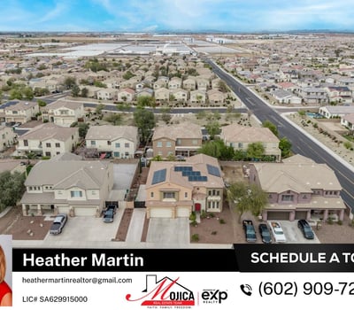 Wide drone view places the home within a thriving Glendale community. Featuring solar panels, a private pool, and low-maintenance landscaping, this property offers exceptional lifestyle value.