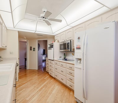 Functional kitchen with generous cabinet space, modern appliances, and efficient layout designed for everyday convenience.