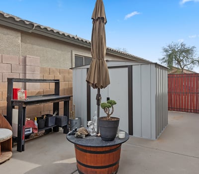 RV gate with dedicated concrete slab, providing secure parking and added versatility for vehicles or storage in Phoenix.