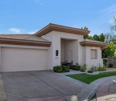 Modern Phoenix exterior featuring a clean facade, private entry, and attached garage in a desirable community setting.