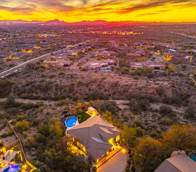 Aerial perspective showcasing expansive lot size, privacy, and breathtaking Scottsdale mountain views in a sought-after desert setting.