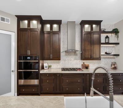 Custom kitchen with built-in oven, sleek cabinetry, and gas cooktop, offering both functionality and luxury in this Scottsdale property.