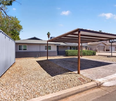 Covered parking combined with storage solutions, adding functionality and value to this remodeled Phoenix investment property.