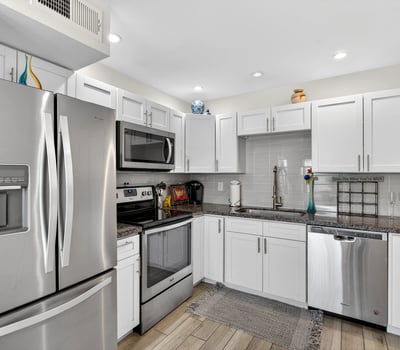 Sleek kitchen in Scottsdale with stainless steel appliances, contemporary cabinetry, and durable counters for a clean, updated look.
