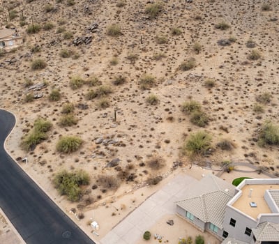 Stunning hillside lot located within the natural desert landscape of Phoenix. Surrounded by mountain scenery and luxury custom homes, this elevated property offers privacy and exceptional build possibilities.