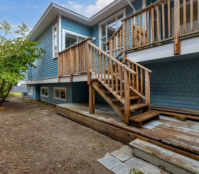This property features a spacious deck, ideal for outdoor gatherings, and a low-maintenance yard.