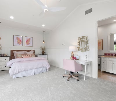Bedroom 4-Spacious bedroom with soft carpeting, modern fixtures, and a dedicated workspace offering delightful natural light.