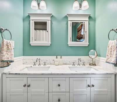 Dual sinks and medicine cabinets.