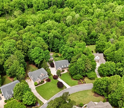Discover this spacious neighborhood surrounded by lush greenery, offering both privacy and community connectivity.