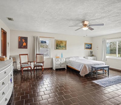 The Master Bedroom with an ensuite bathroom, newly remodeled and very large! Previous owners had a California King sleigh bed. Make it a private oasis- make it your own!
