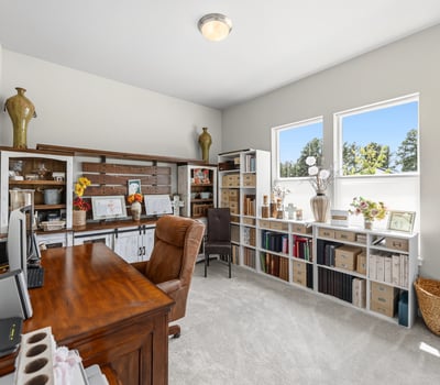 Main level bedroom used as a craft room