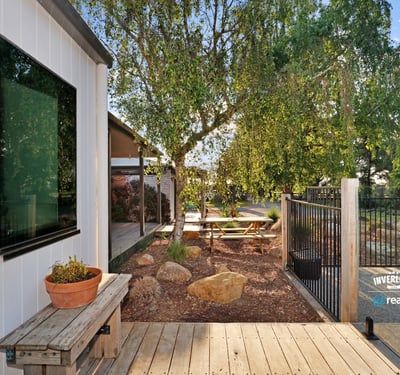 Modern outdoor space featuring a tranquil garden area, perfect for relaxation and entertaining.