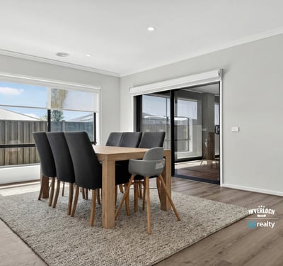Spacious dining area with natural light, perfect for gatherings and enjoying views of the outdoor space.