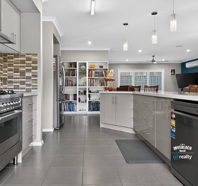 Modern kitchen featuring sleek cabinetry, stainless steel appliances, and an open layout perfect for entertaining.