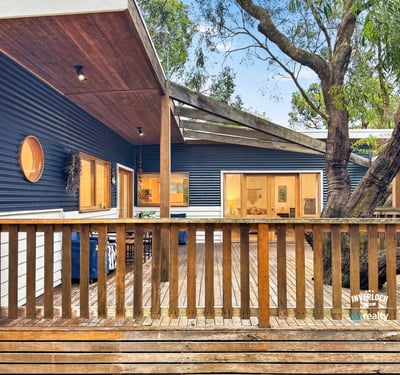 Discover this unique home featuring an open deck, contemporary design, and natural surroundings for optimal outdoor living.