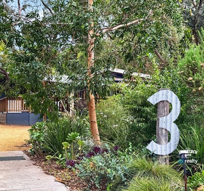 Nestled in lush greenery, this property offers a unique blend of comfort and natural beauty.