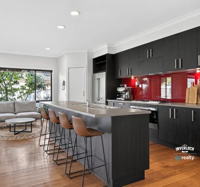 Contemporary kitchen featuring sleek cabinetry, a spacious island, and an open layout perfect for entertaining.