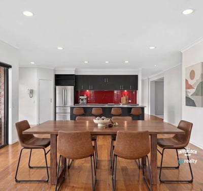 Modern kitchen and dining area with sleek finishes, perfect for entertaining and everyday living.