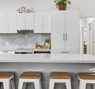Modern kitchen featuring sleek cabinetry, a spacious island, and contemporary finishes perfect for entertaining.