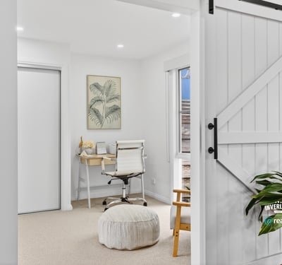 Bright and inviting workspace featuring modern furnishings and natural light, perfect for productivity and relaxation.