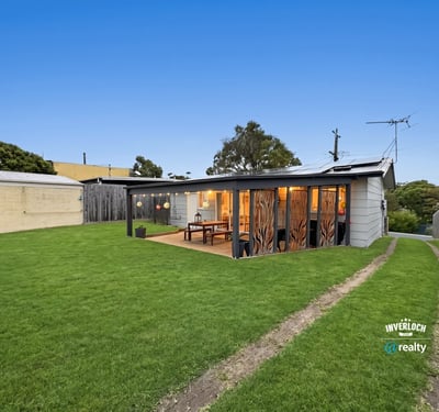 Discover this unique property featuring a spacious yard and modern outdoor living space, perfect for entertaining.