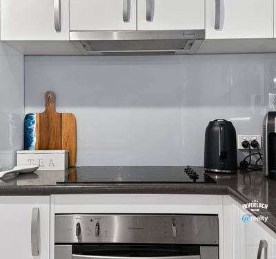 Modern kitchen featuring sleek cabinetry, contemporary appliances, and a functional layout for effortless cooking.