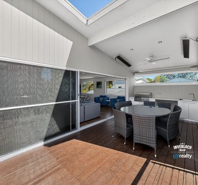 Spacious outdoor living area featuring a modern design, perfect for entertaining and relaxation.