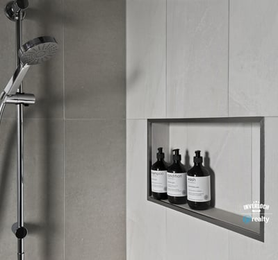 Modern shower featuring a sleek design and built-in niche for organized storage of essentials.