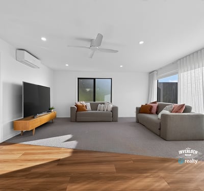 Bright and spacious living area features modern finishes and abundant natural light, perfect for relaxation.